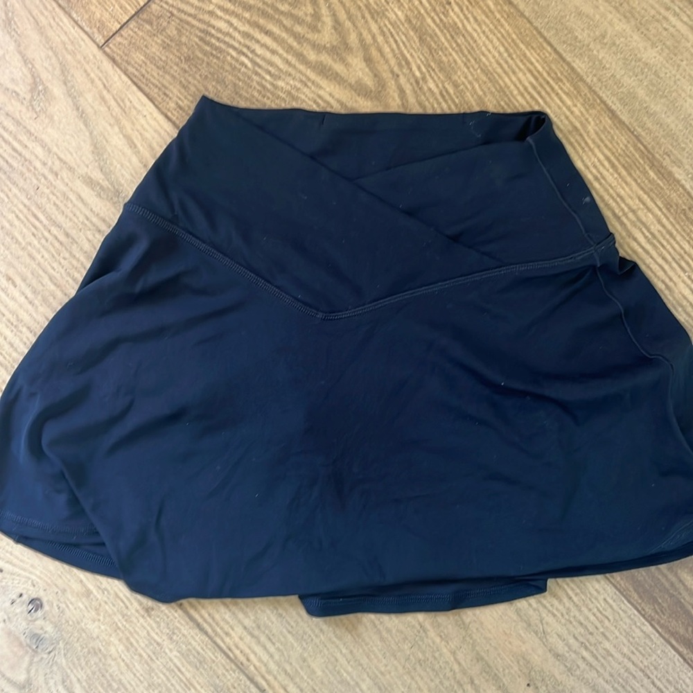 Aerie super cute mini athletic skirt. With front cross. Shorts inside.